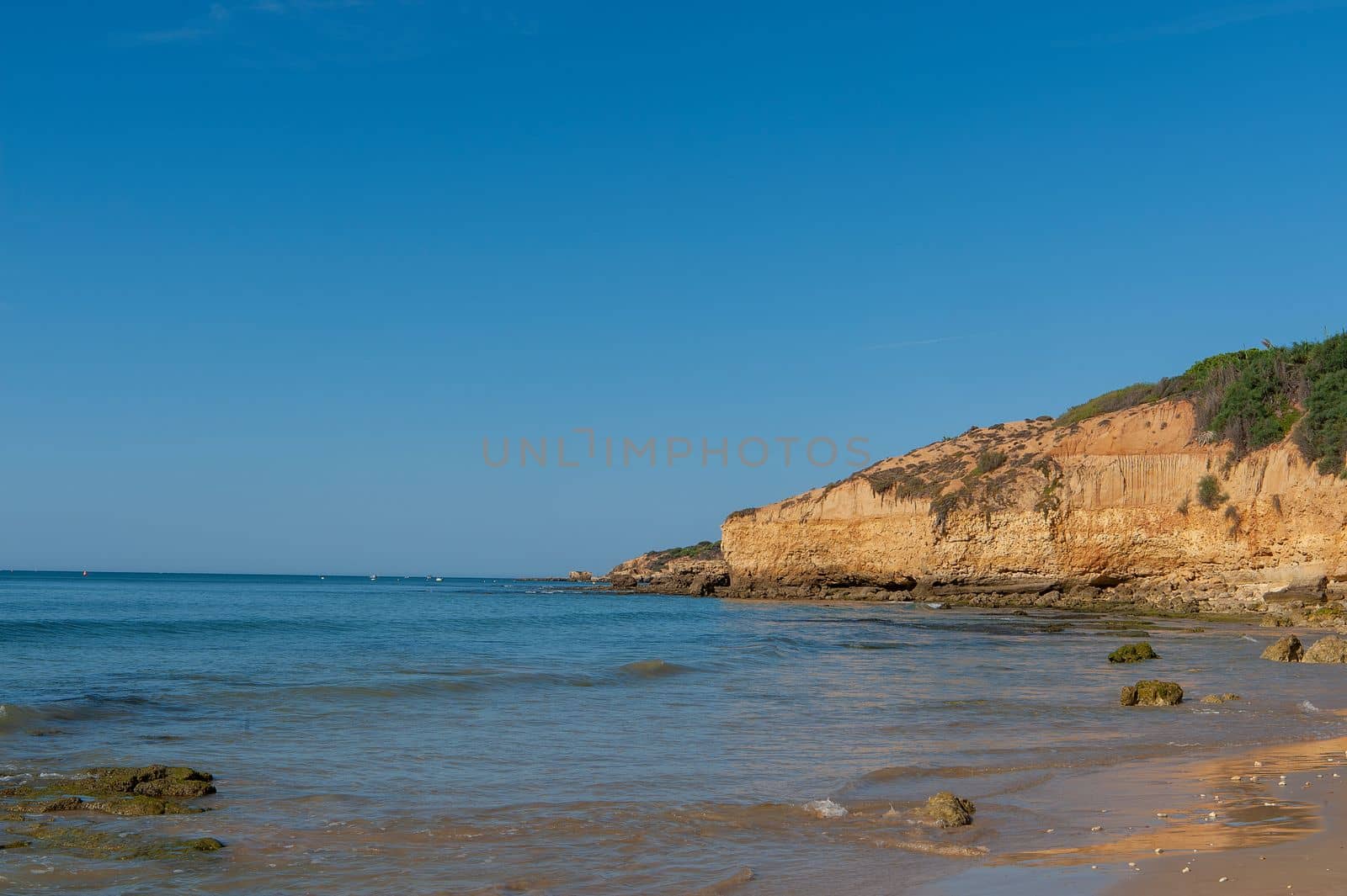 Maria Luisa beach with rock formation in Albufeira, Algarve, Portugal.
