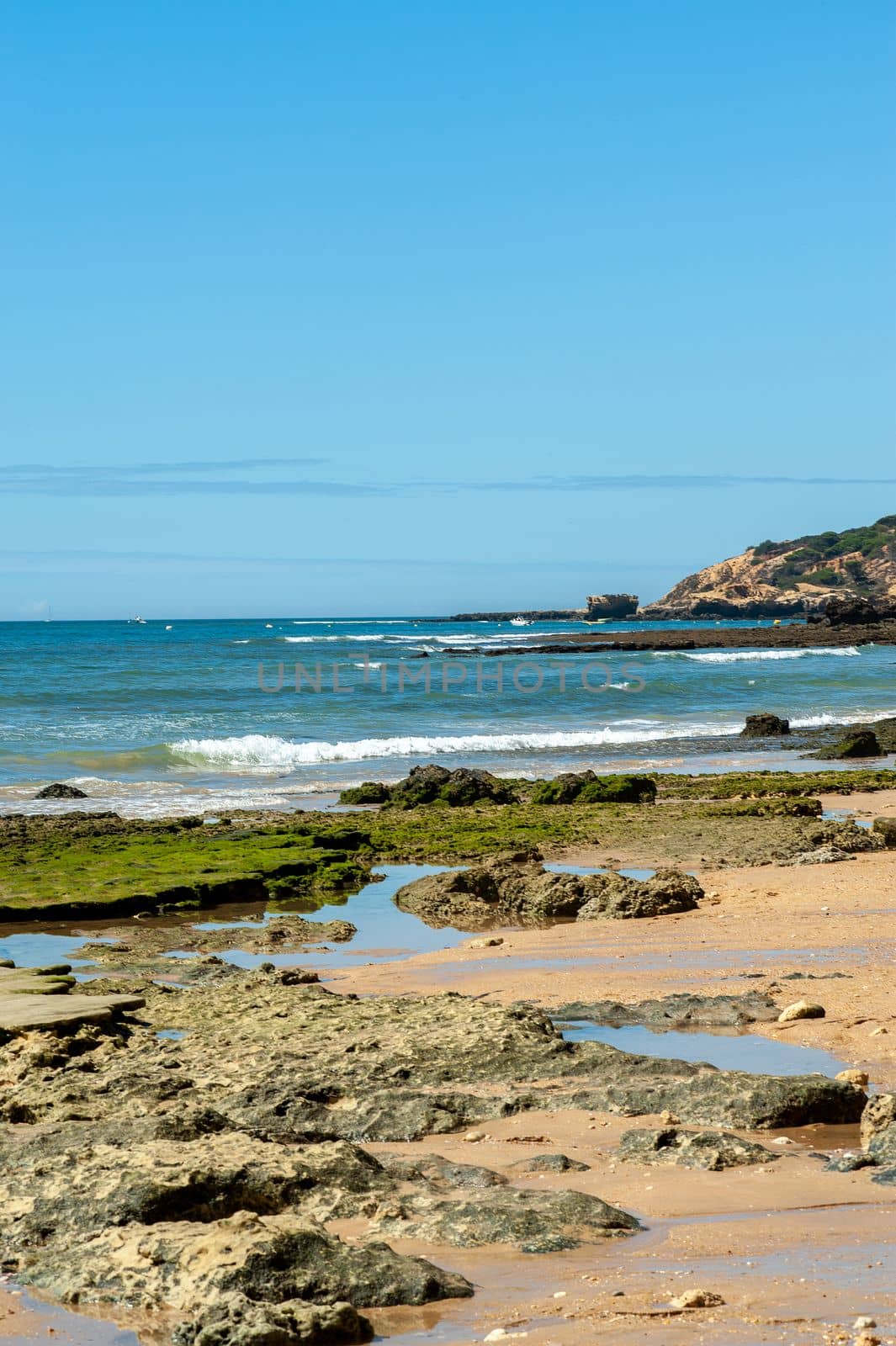 Maria Luisa beach with rock formation in Albufeira, Algarve, Portugal.