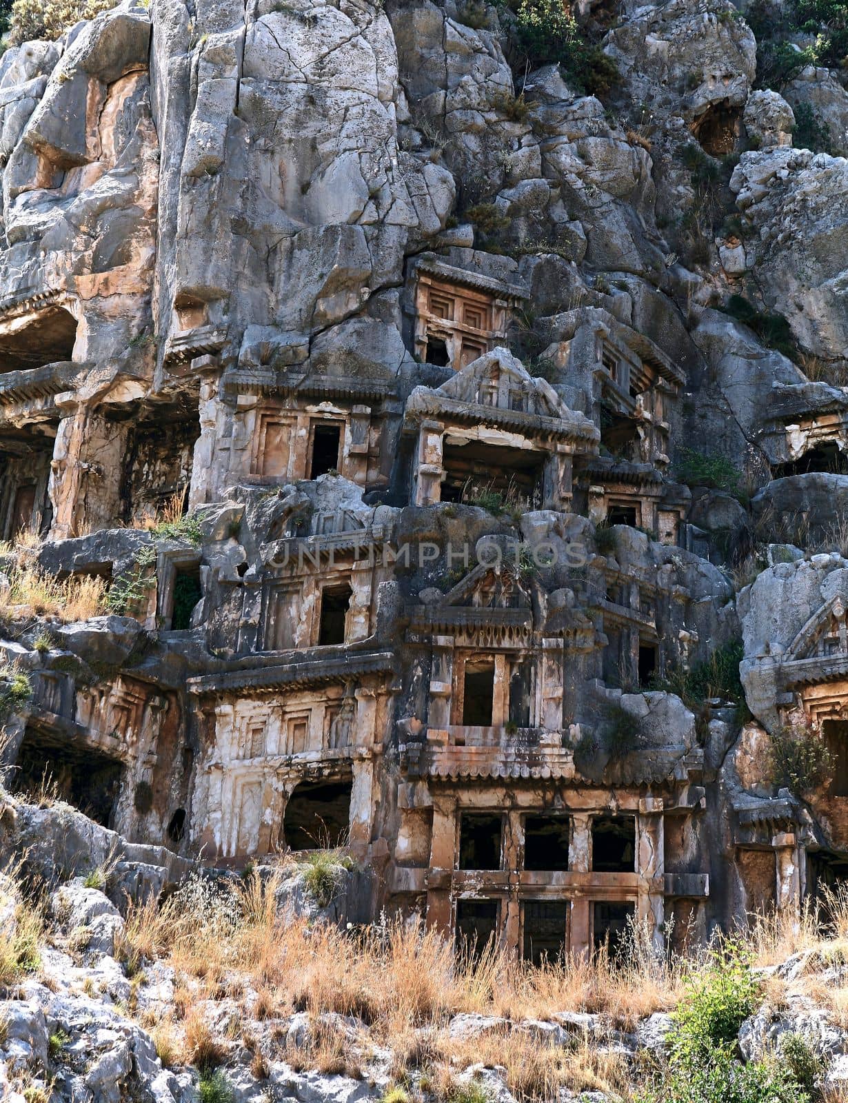 Koycegiz, Mugla, Turkey - July 12 2017: The rock tombs of the kings in the ancient city of Kaunos in Koycegiz Dalyan