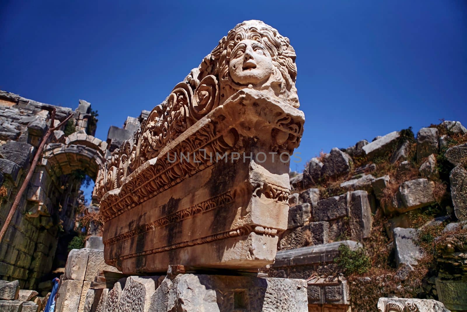 Stone Theater masks in Myra Ancient City. Demre, Antalya, Turkey