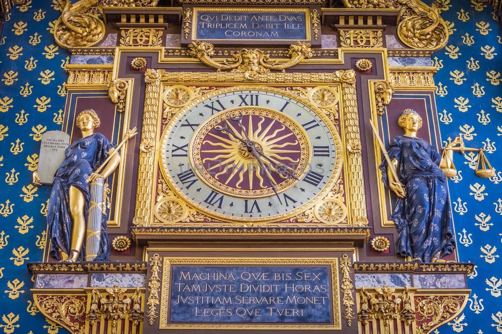 La Conciergerie Horloge, ornate Clock Tower of Palais de Justice close-up, Paris, France