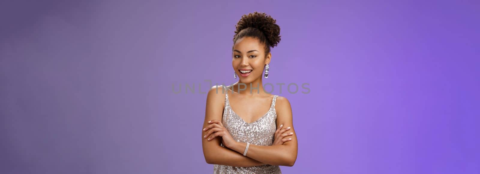 Stylish lucky happy attractive african-american female in glittering silver night-dress cross arms chest self-assured arrogant smiling delighted rejoicing nice interesting evening, satisfied by Benzoix