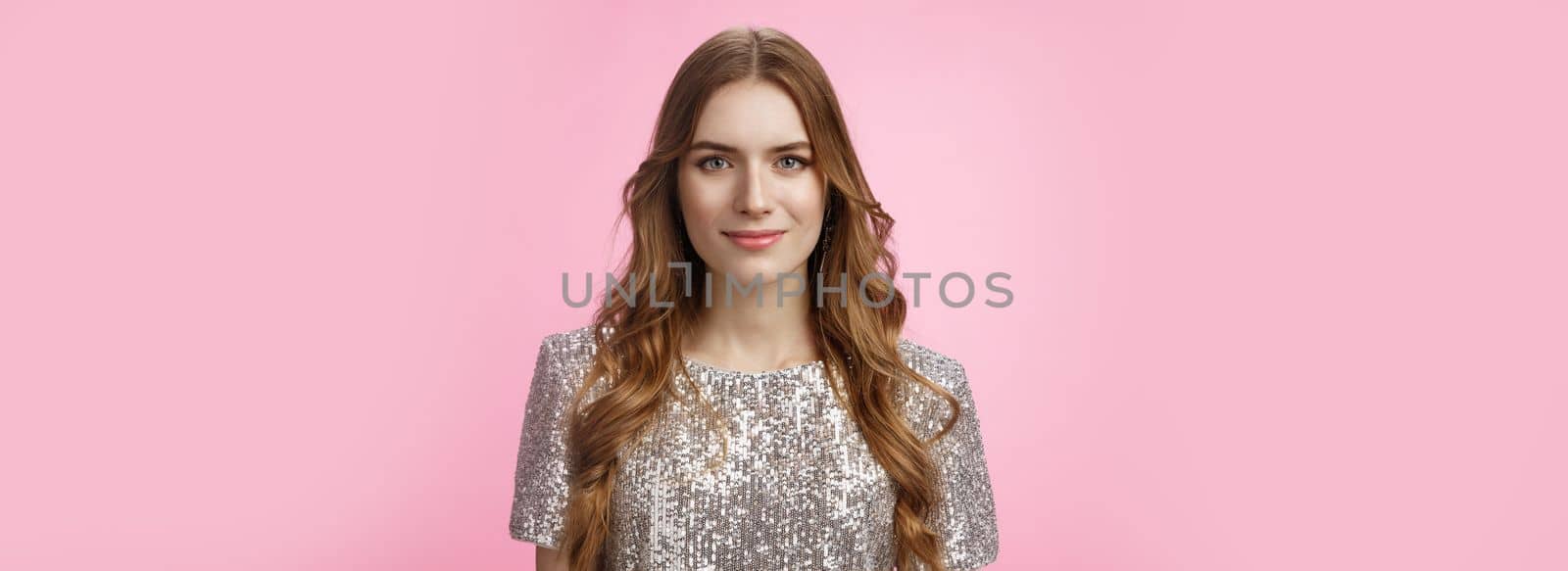 Close-up confident determined attractive stylish woman evening makeup curly hairstyle wearing party outfit smiling self-assured, dress-up evening dance club, standing happily pink background.