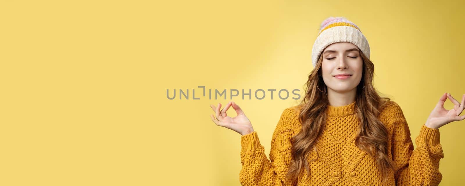 Keep calm carry on. Portrait relieved happy meditating charming young woman learn control feelings breething yoga practice smiling delighted relaxed close eyes hands sideways zen nirvana gesture by Benzoix