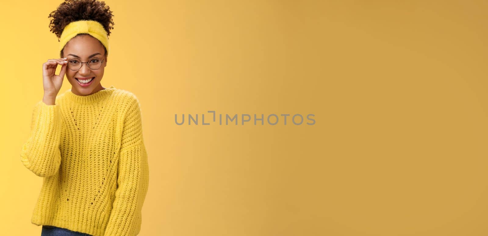 Attractive friendly charismatic female programmer frontend developer smiling broadly check glasses nose look confident lucky have excellent idea improve app workability, standing yellow background by Benzoix