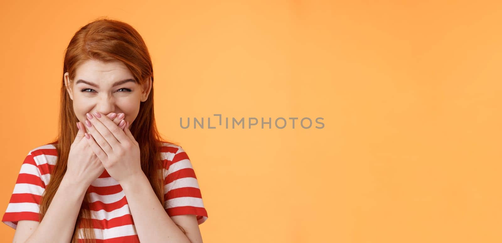 haha very funny. Silly tender cheerful redhead girl laughing, giggle hilarious joke, cover mouth press palms lips chuckling silent, mocking friend, stand upbeat orange background, by Benzoix