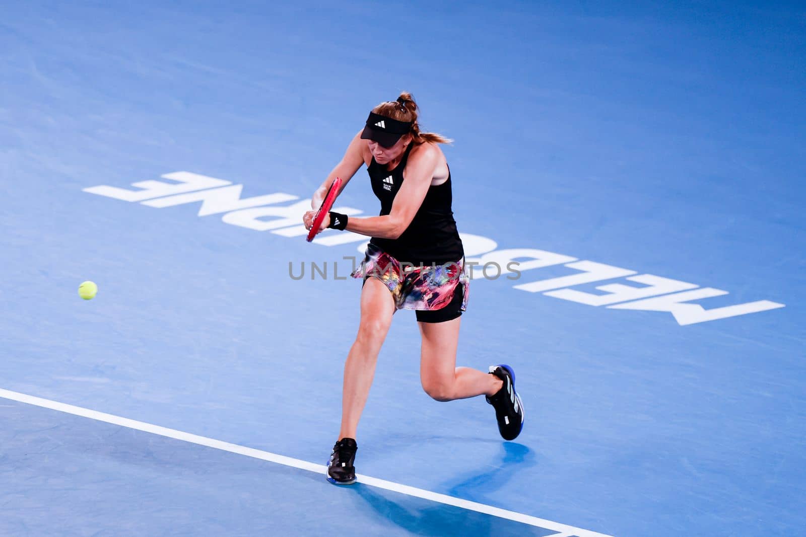 MELBOURNE, AUSTRALIA - JANUARY 24: Elena Rybakina of Russia plays Jelena Ostapenko of Latvia in quarter finals action on day 9 of the 2023 Australian Open at Melbourne Park on January 24, 2023 in Melbourne, Australia.