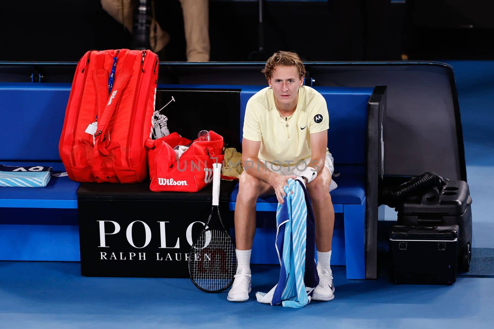 MELBOURNE, AUSTRALIA - JANUARY 24: Sebastian Korda of USA receives treatement for his wrist whilst playing Karen Khachanov of Russia in quarter final action on day 9 of the 2023 Australian Open at Melbourne Park on January 24, 2023 in Melbourne, Australia.