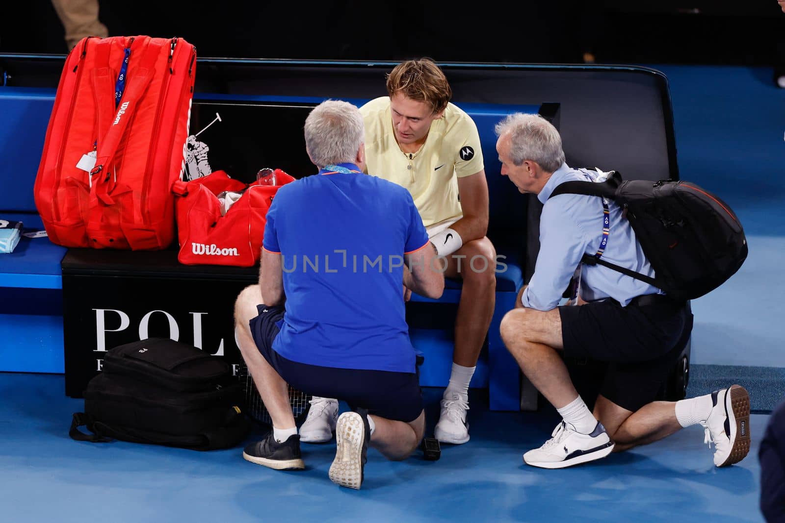 MELBOURNE, AUSTRALIA - JANUARY 24: Sebastian Korda of USA receives treatement for his wrist whilst playing Karen Khachanov of Russia in quarter final action on day 9 of the 2023 Australian Open at Melbourne Park on January 24, 2023 in Melbourne, Australia.
