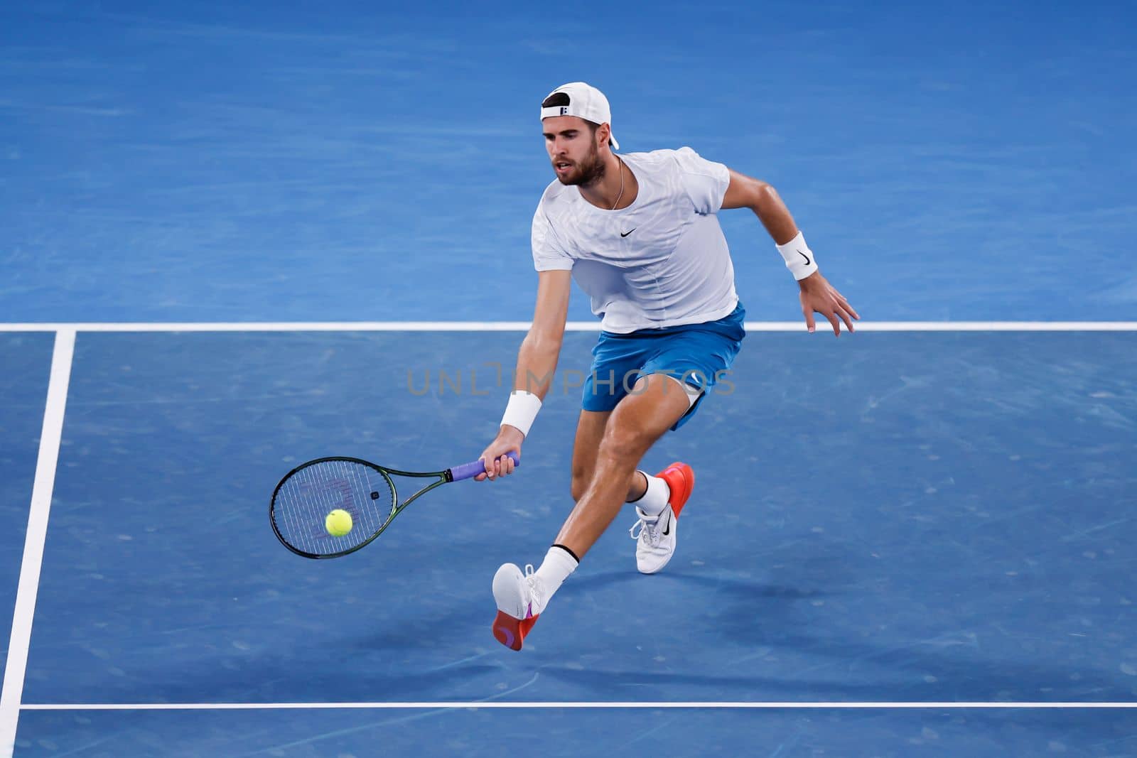 MELBOURNE, AUSTRALIA - JANUARY 24: Karen Khachanov of Russia in quarter final action against Sebastian Korda of USA on day 9 of the 2023 Australian Open at Melbourne Park on January 24, 2023 in Melbourne, Australia.
