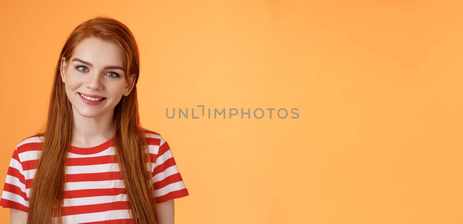 Close-up tender cute redhead young woman smiling joyfully, express happiness friendly emotions, look camera silly lovely grin, gaze satisfied, chat delighted, pleasant conversation orange background by Benzoix