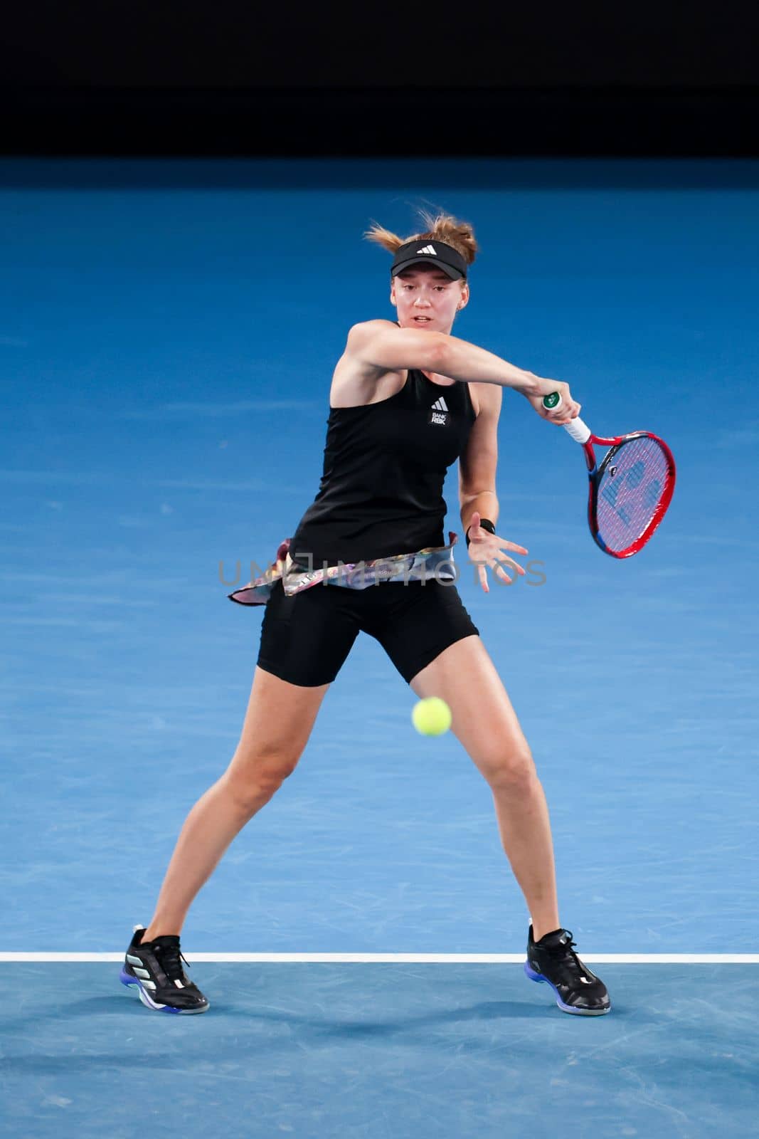 MELBOURNE, AUSTRALIA - JANUARY 24: Elena Rybakina of Russia plays Jelena Ostapenko of Latvia in quarter finals action on day 9 of the 2023 Australian Open at Melbourne Park on January 24, 2023 in Melbourne, Australia.