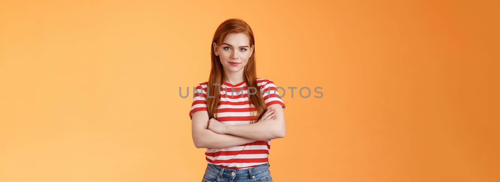 Go on try me. Confident cool redhead daring woman cross arms professional pose, smiling determined motivated win, look assertive and assured own powers, stand orange background by Benzoix