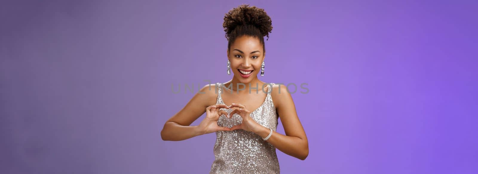 Girl totally loved adores look grateful deisgners peek elegant dress b-day party show heart gesture smiling happily expressing love heartwarming passionate feelings standing gladly blue background by Benzoix