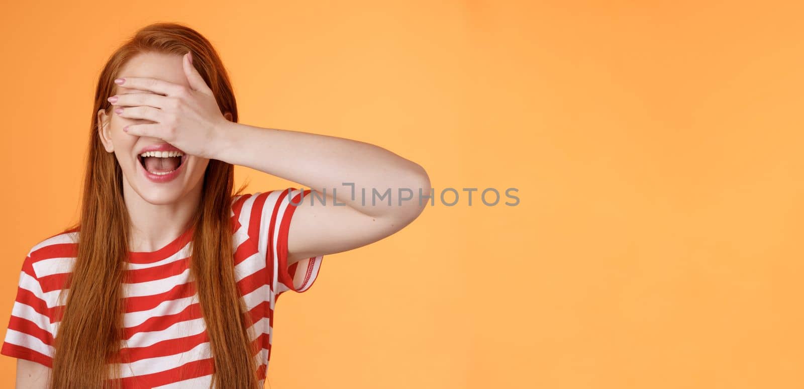 Enthusiastic cute happy redhead woman celebrate birthday counting ten closed eyes, cover sight palm, open mouth excited, waiting surprise gift, eager receive present, playing hide-n-seek.