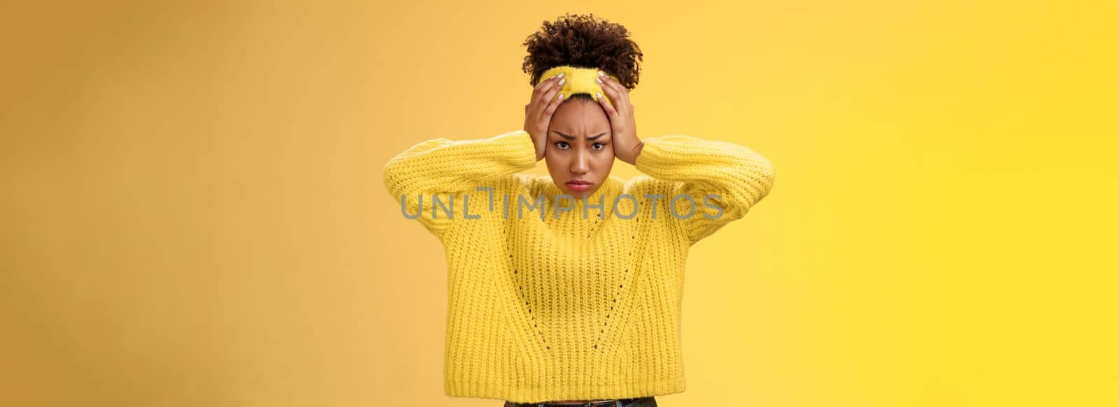 Troubled gloomy perplexed pressured attractive cute african-american girl bothered cannot hold stress touching head blow problems sulking frowning concerned face unsolvable bad situation by Benzoix
