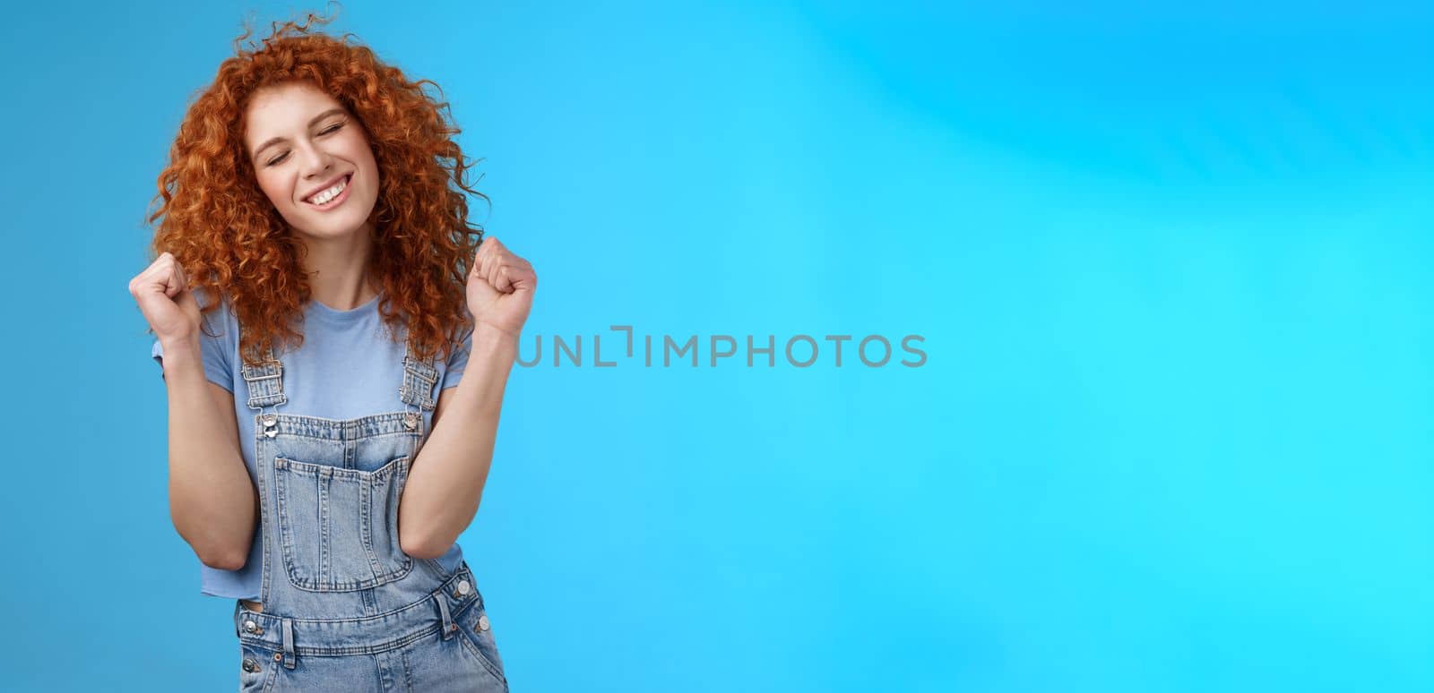 Hooray summer mood finally warm days. Silly happy cheerful tender redhead wild girl cute natural curls close eyes smiling broadly triumphing joyfully clench fists celebration festive positive mood by Benzoix