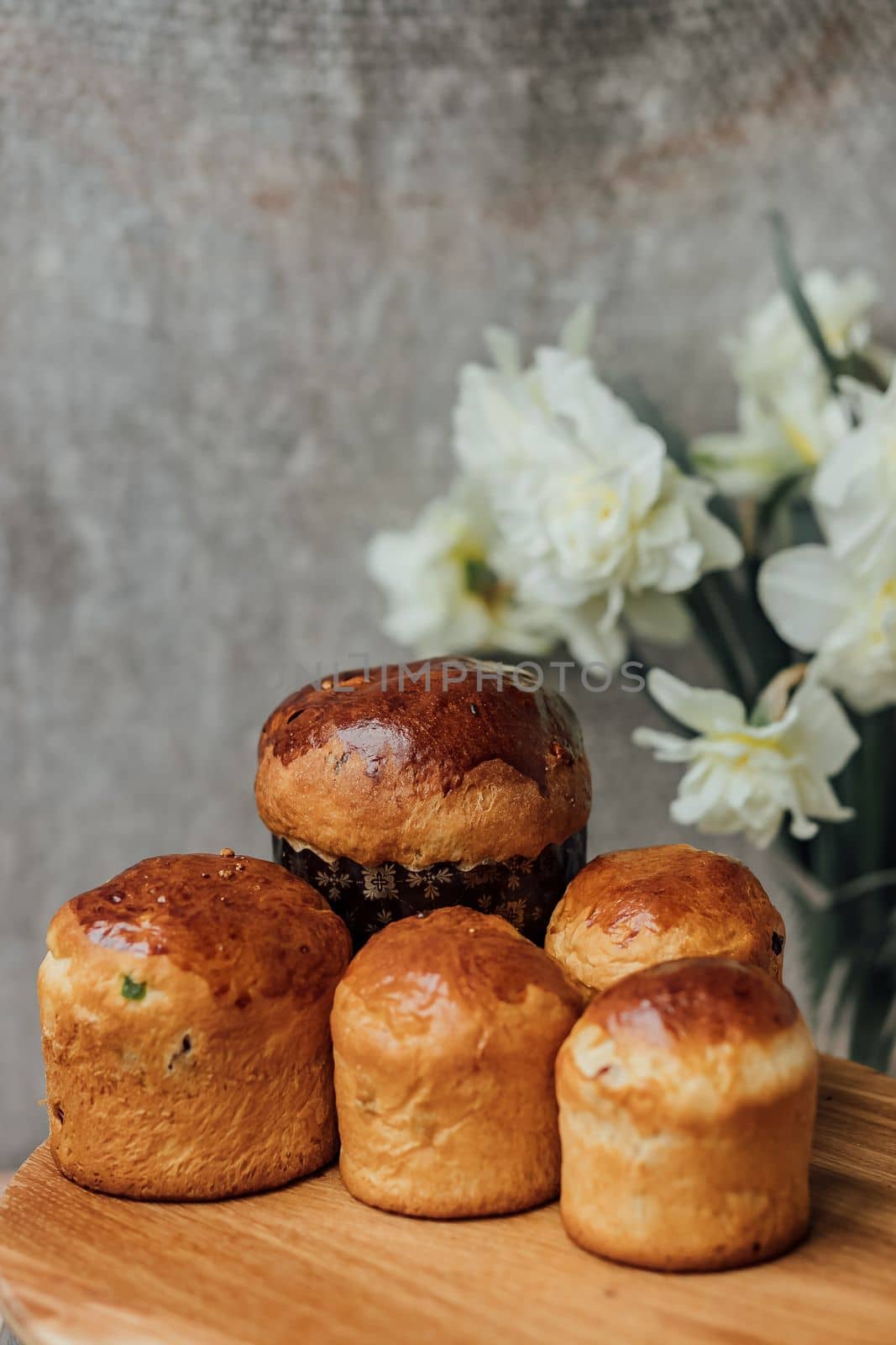 Delicious Easter cake and ingredients on wooden table