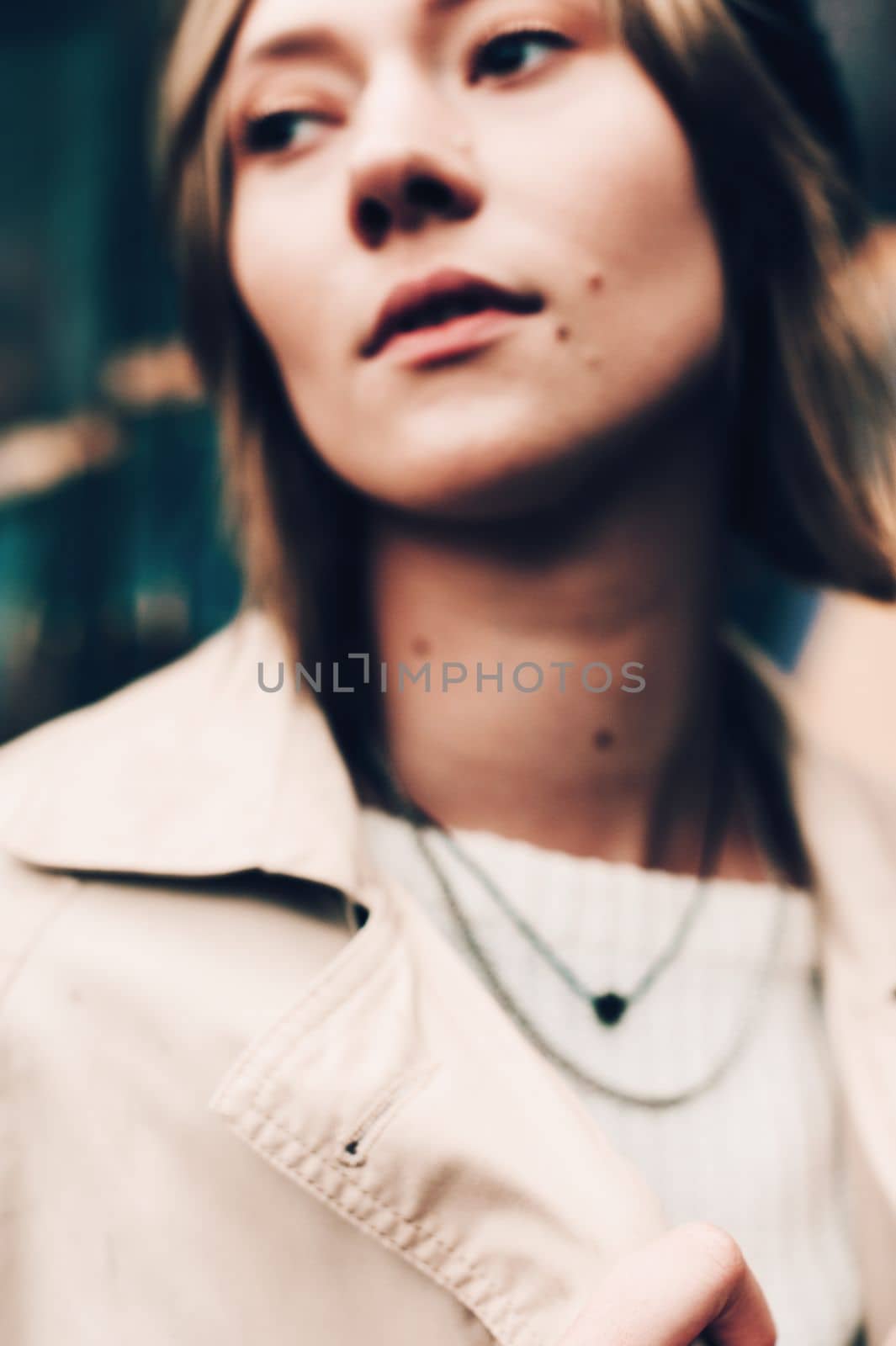 Close-up portrait Beautiful elegant woman wearing beige coat and black hat. Trendy casual outfit. Soft selective focus. grain by Ashtray25