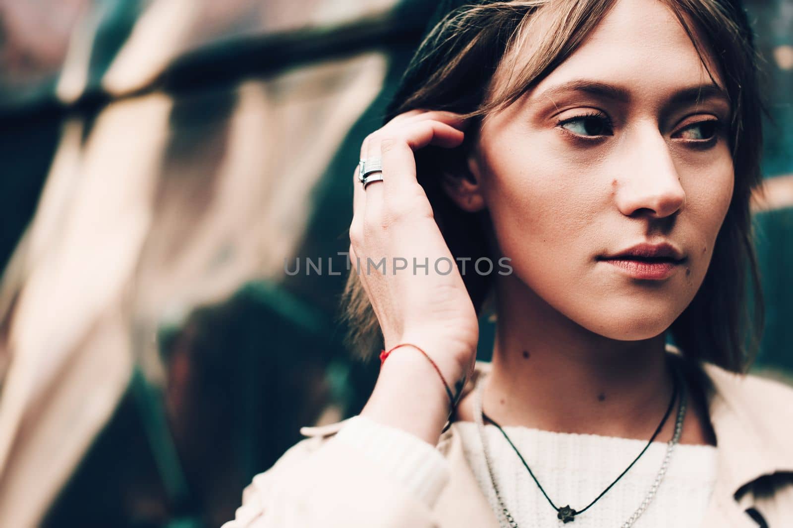 Close-up portrait Beautiful elegant woman wearing beige coat and black hat. Trendy casual outfit. Soft selective focus. grain by Ashtray25