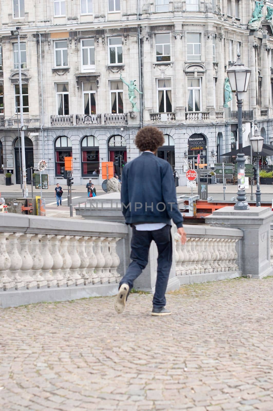 African American man with curly thick black hair, Antwerp, Belgium, 12 July 2019 by KaterinaDalemans