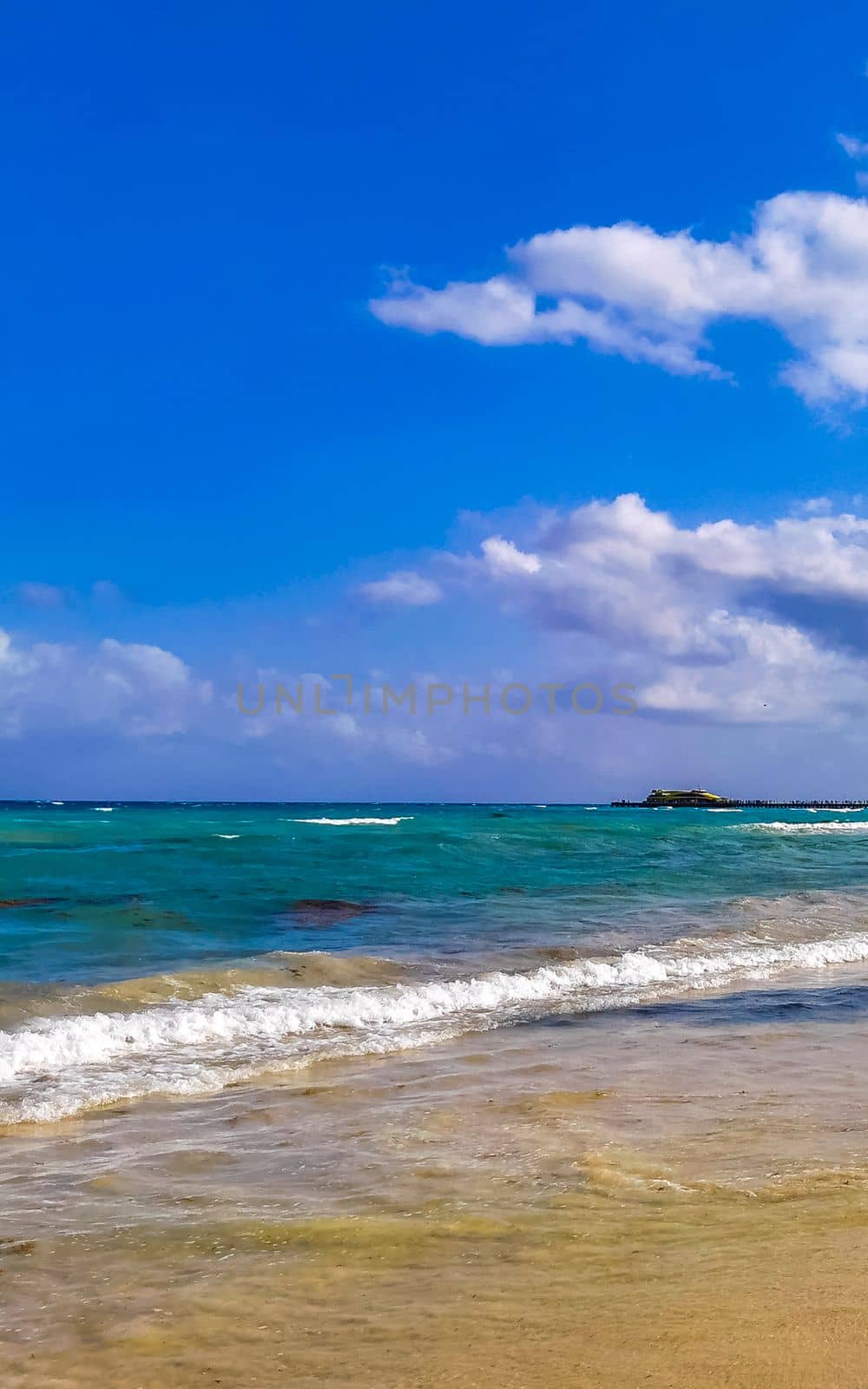 Tropical caribbean beach clear turquoise water Playa del Carmen Mexico. by Arkadij