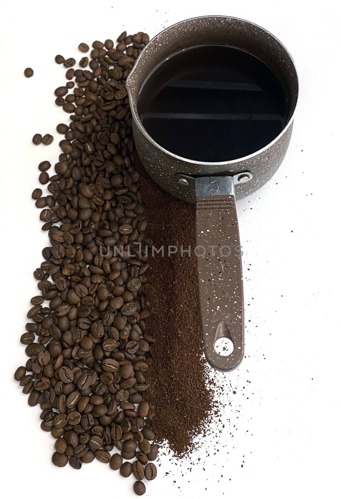 Coffee beans, ground coffee and coffee cezve.