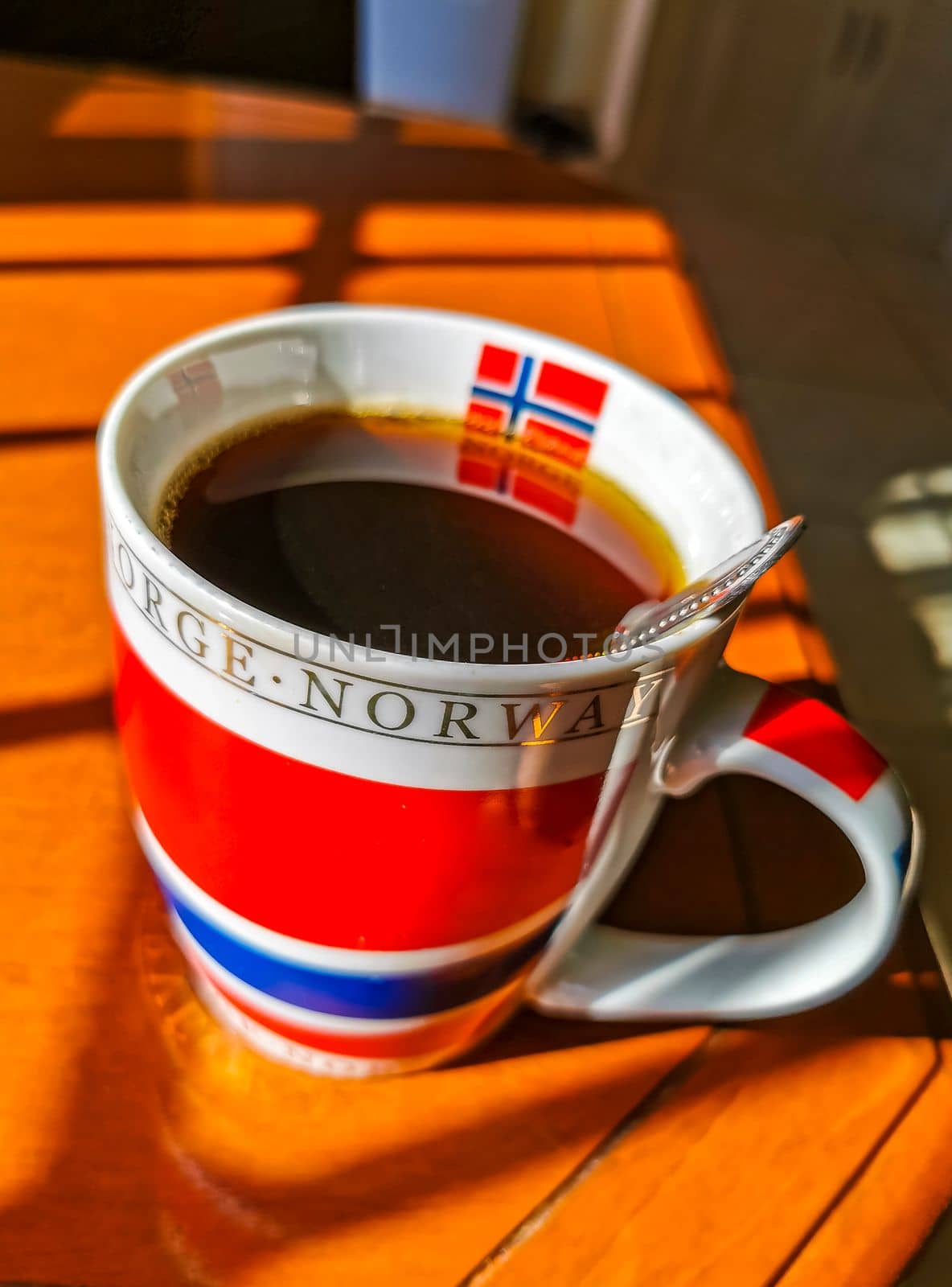 Norwegian coffee cup Norway coffee pot on wooden table in Playa del Carmen Quintana Roo Mexico.