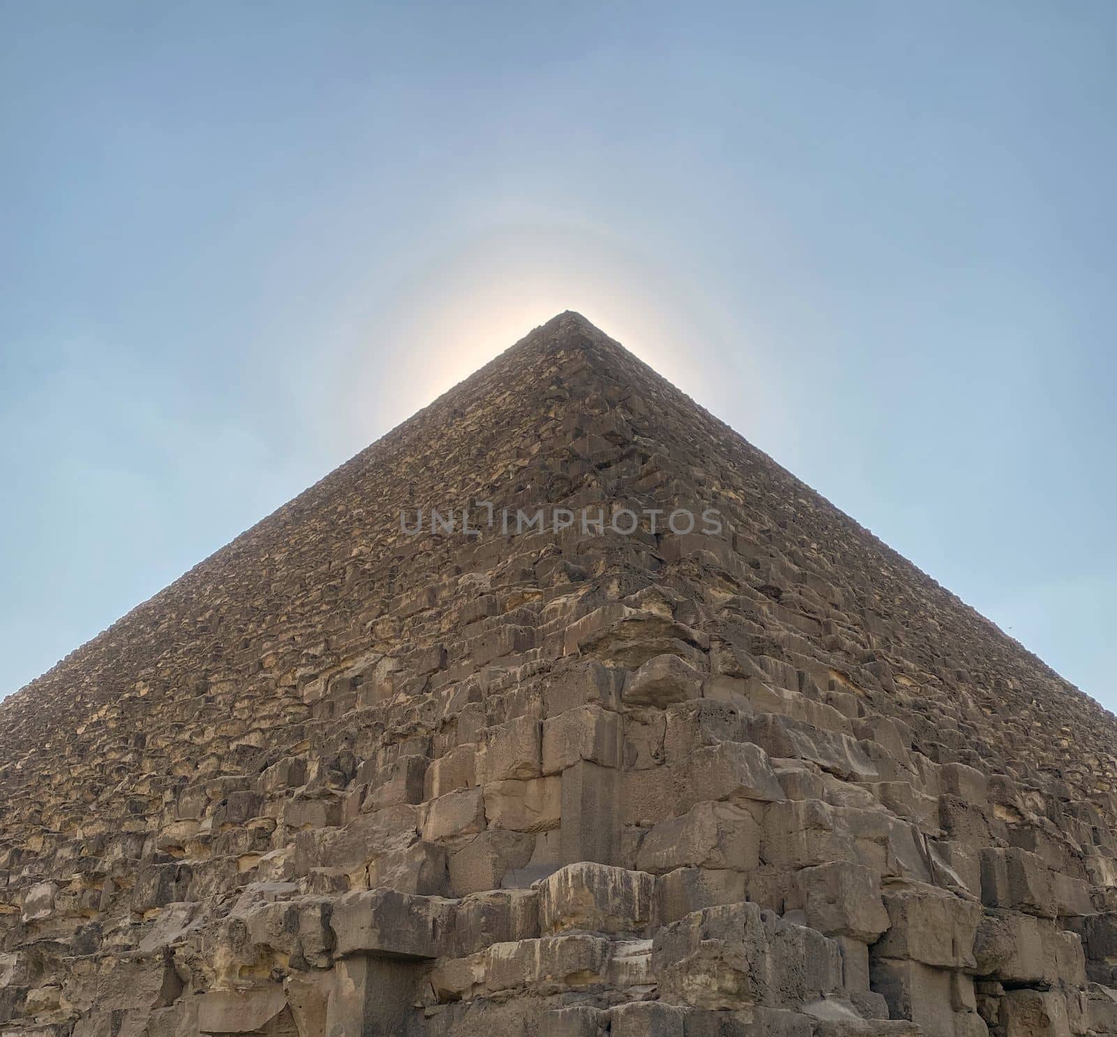 Egyptian pyramid. Pictured is an Egyptian pyramid against a blue sky.