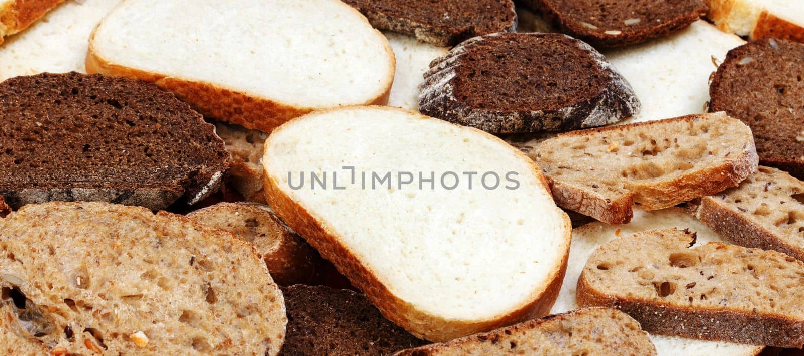 Sliced white and brown loaf of bread.