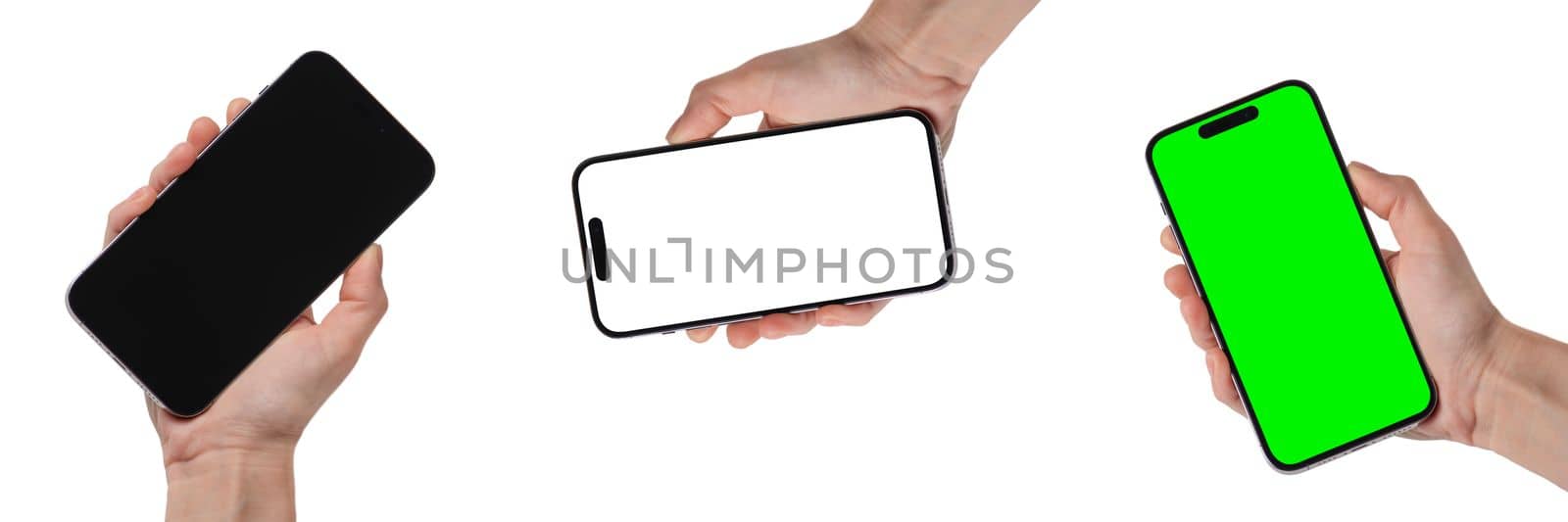 Phone in hand on a white background. A woman's hand holds a new modern phone in her hand on a white background with a blank white screen. Smartphone isolated on green background with green screen