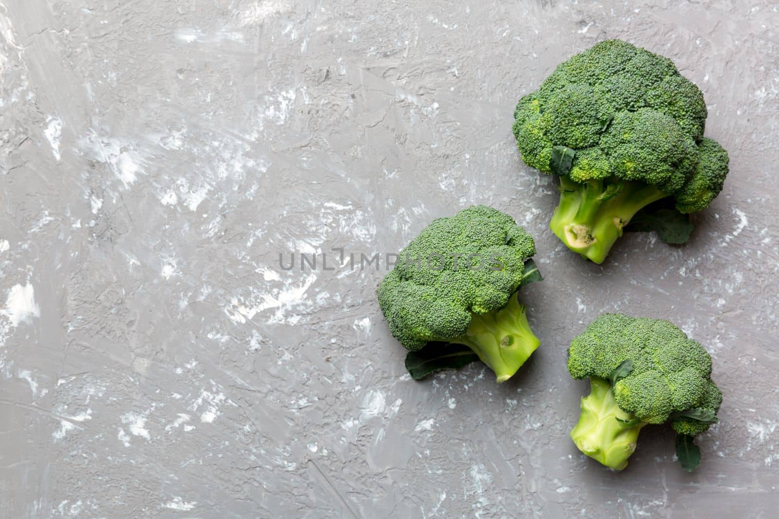 fresh green broccoli isolated on white background