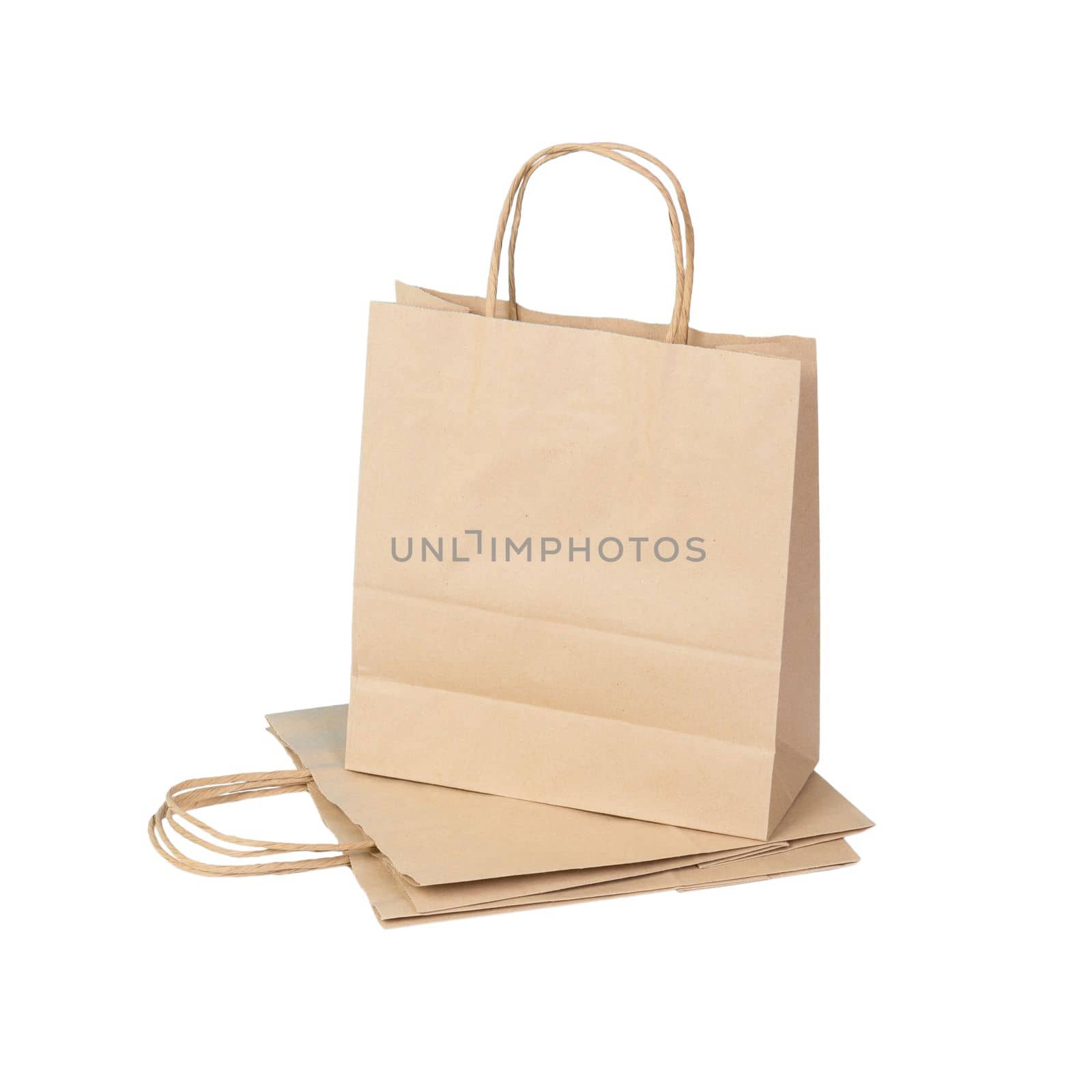 kraft paper ecologic bag on isolated white background.