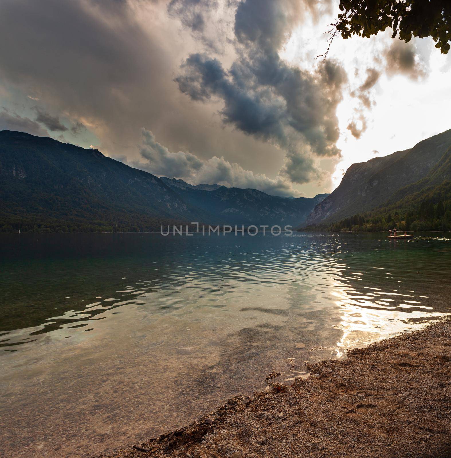 View of scenic Bohinj lake, the largest permanent lake in Slovenia, located within the Bohinj Valley of the Julian Alps