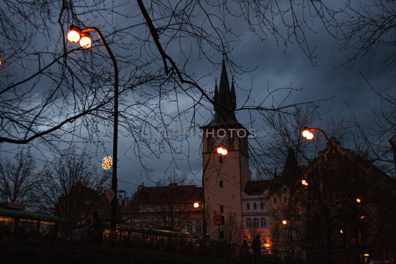 View of the bell tower of the Prague church in the evening, Czech Republic