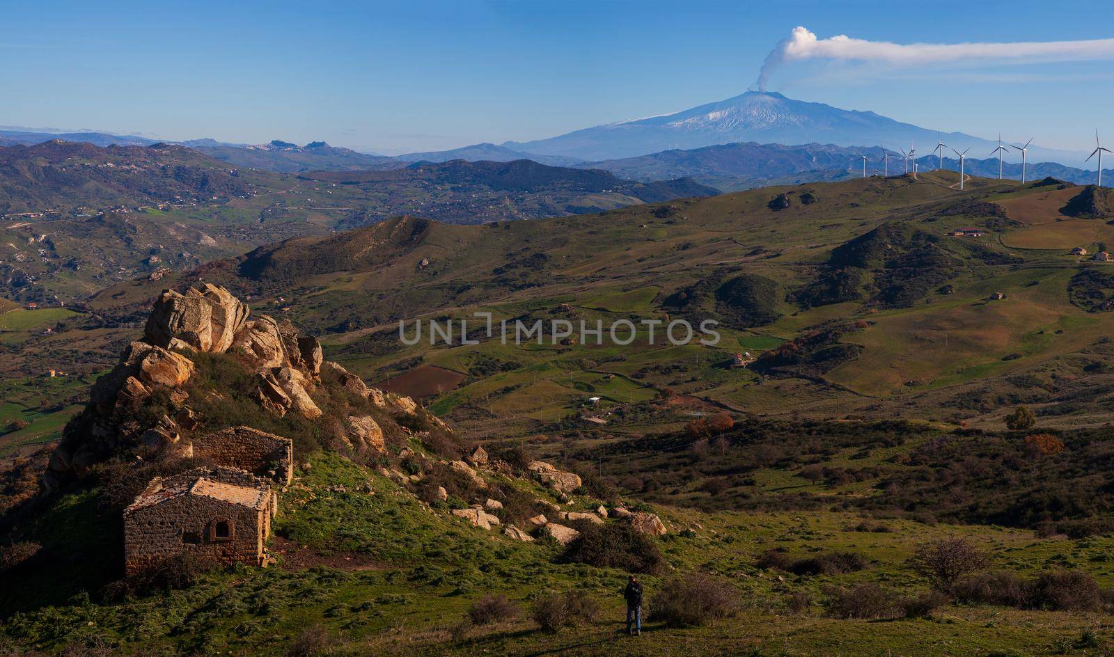 View of the Sicilian countryside. Etna volcano in the background