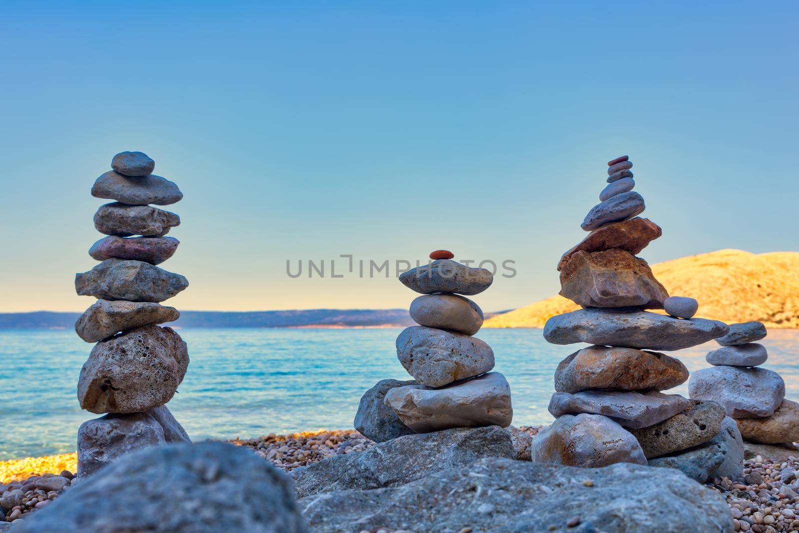 Stack of stones on the Stara Baska beach, Krk. Croatia