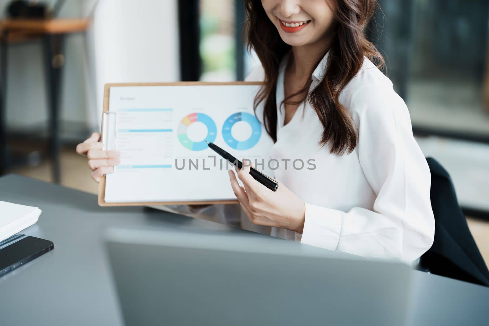 Business work and planning, portrait of a businesswoman using a computer in a meeting.