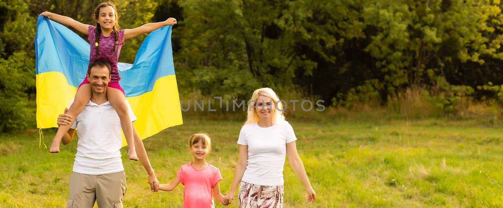 family with the flag of ukraine.