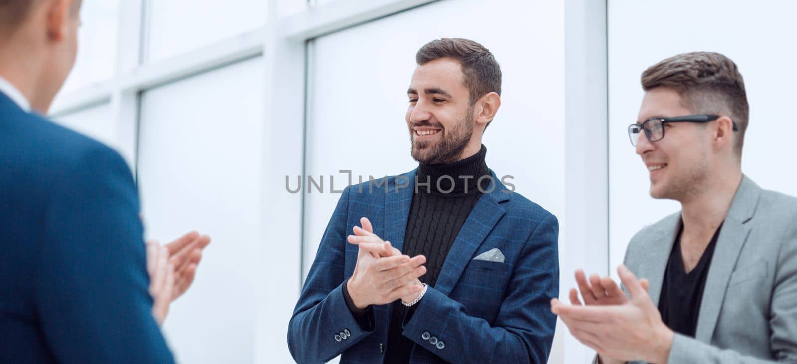 business team meeting a new colleague at the workplace. photo with a copy-space