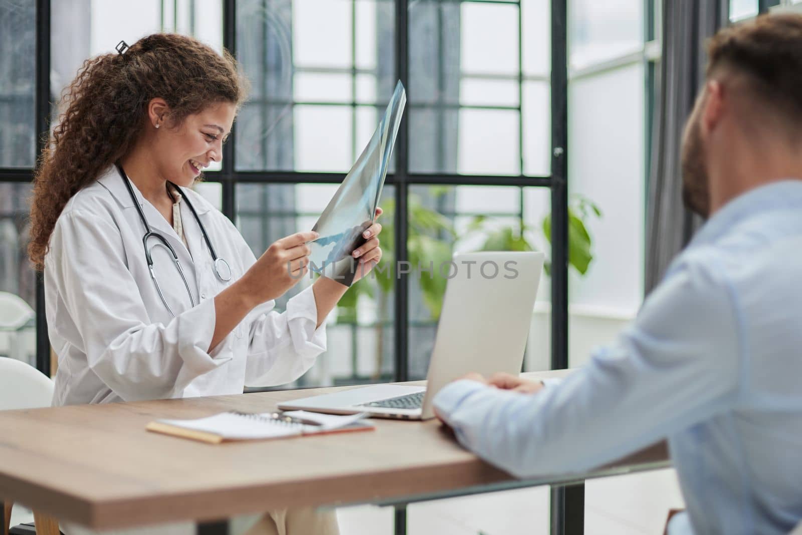 Doctor consulting patient hands closeup. Patient sitting at doctor office. Diagnostic healthcare, medical service, consultation or education, healthy lifestyle concept by Prosto