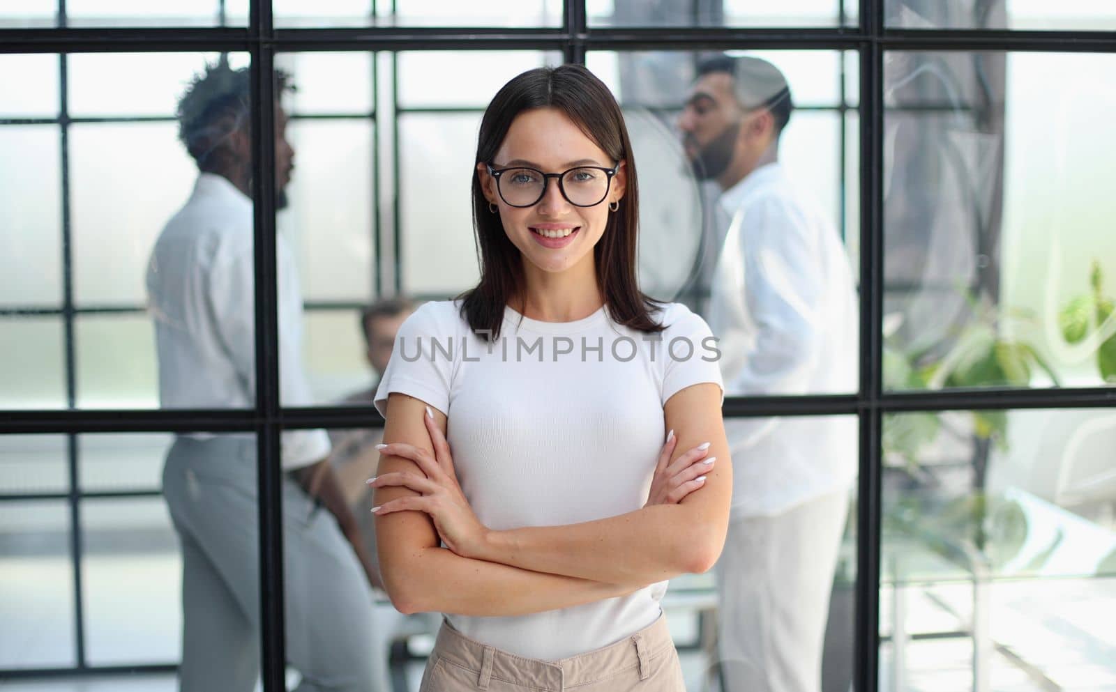 Portrait of a young business woman in an modern office