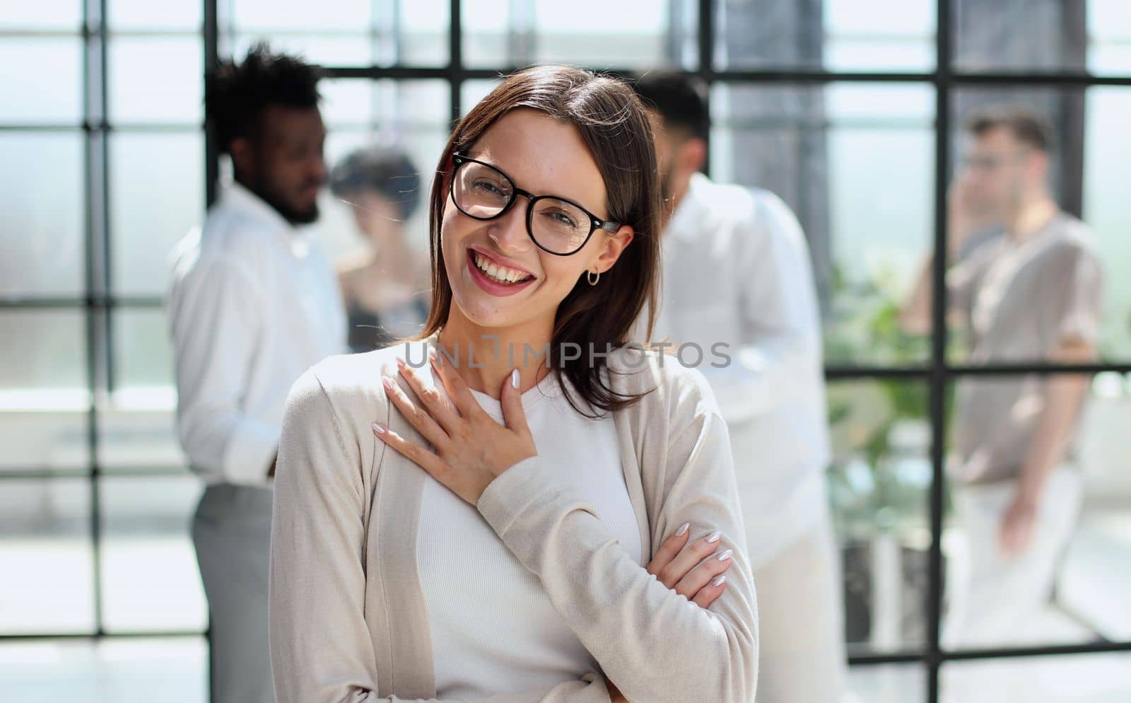 Portrait of a young business woman in an modern office