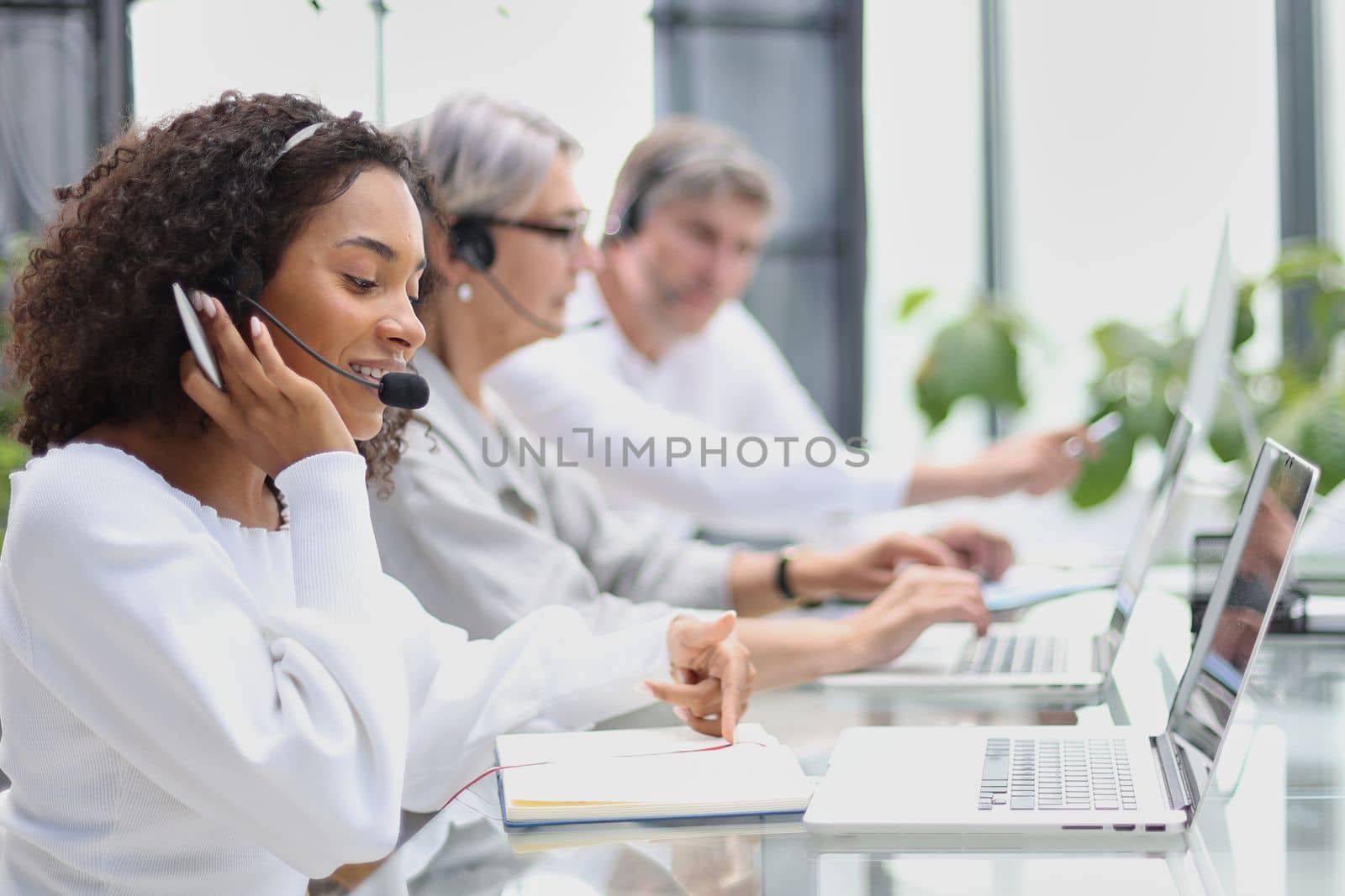 Business group working in customer and help desk office.