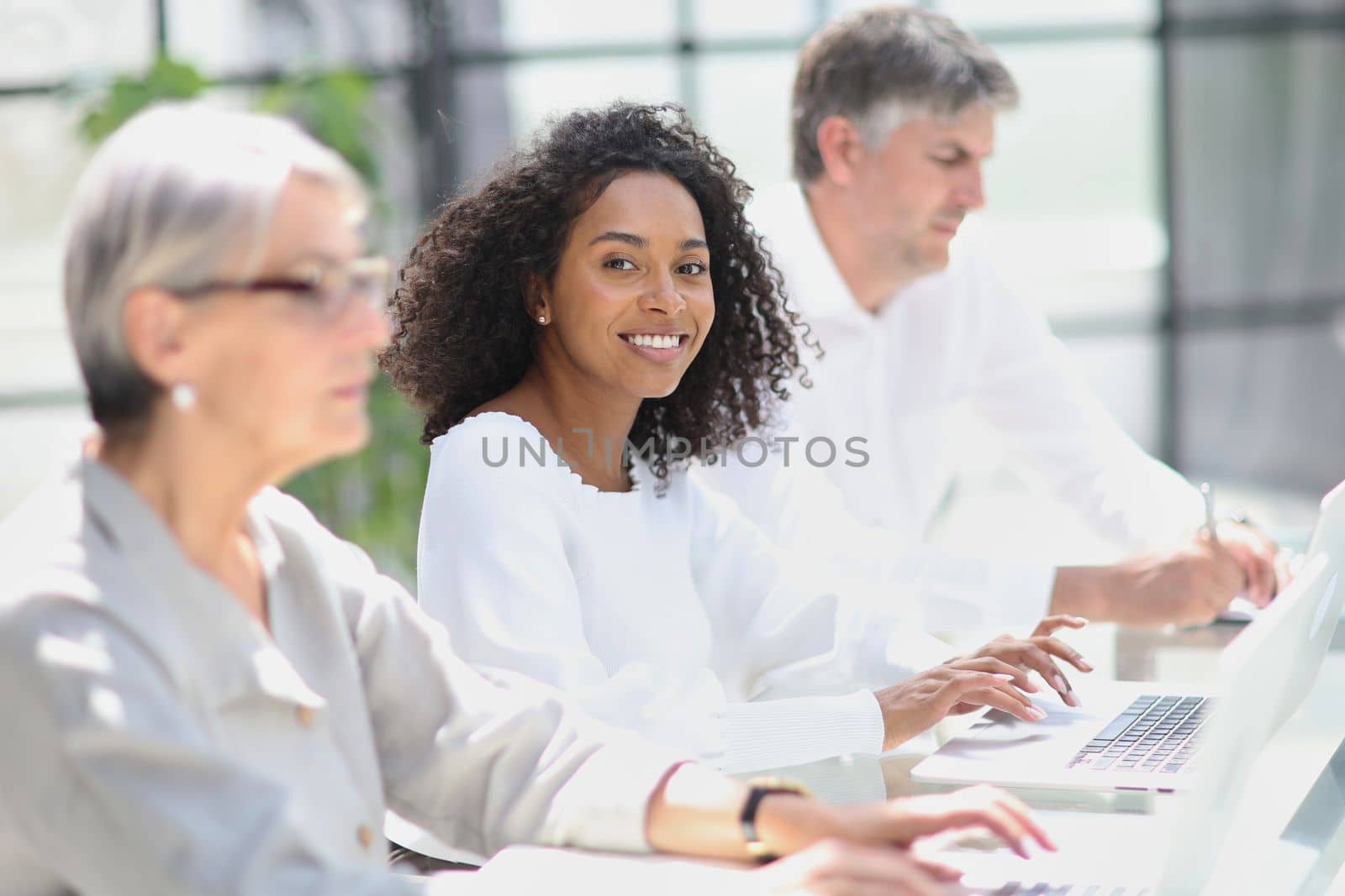 business woman in the office at work with the team.