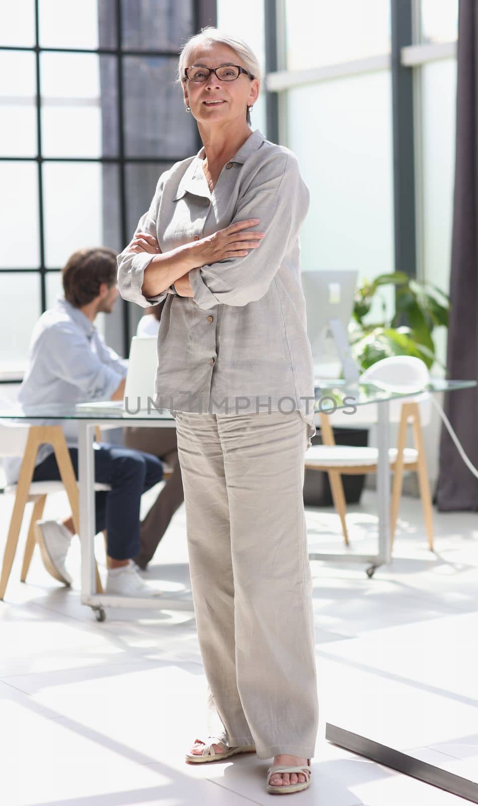 mature woman closeup hands together in the office.