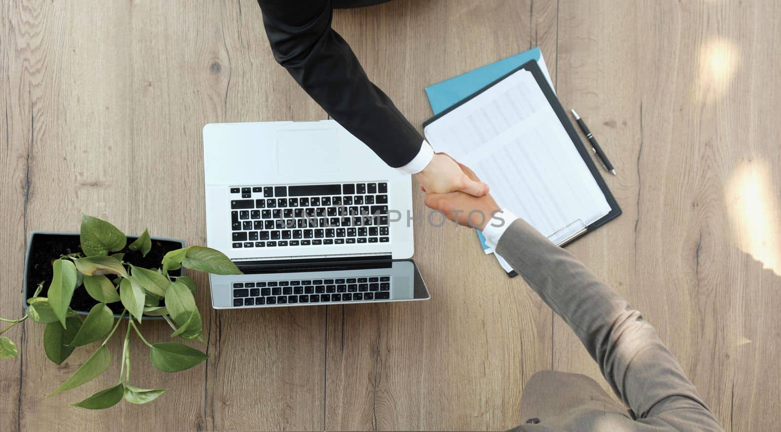 businessmen colleagues shaking hands on meeting in office, diverse enterpreneurs striking good deal, multiethnic teammates succeed in common project work