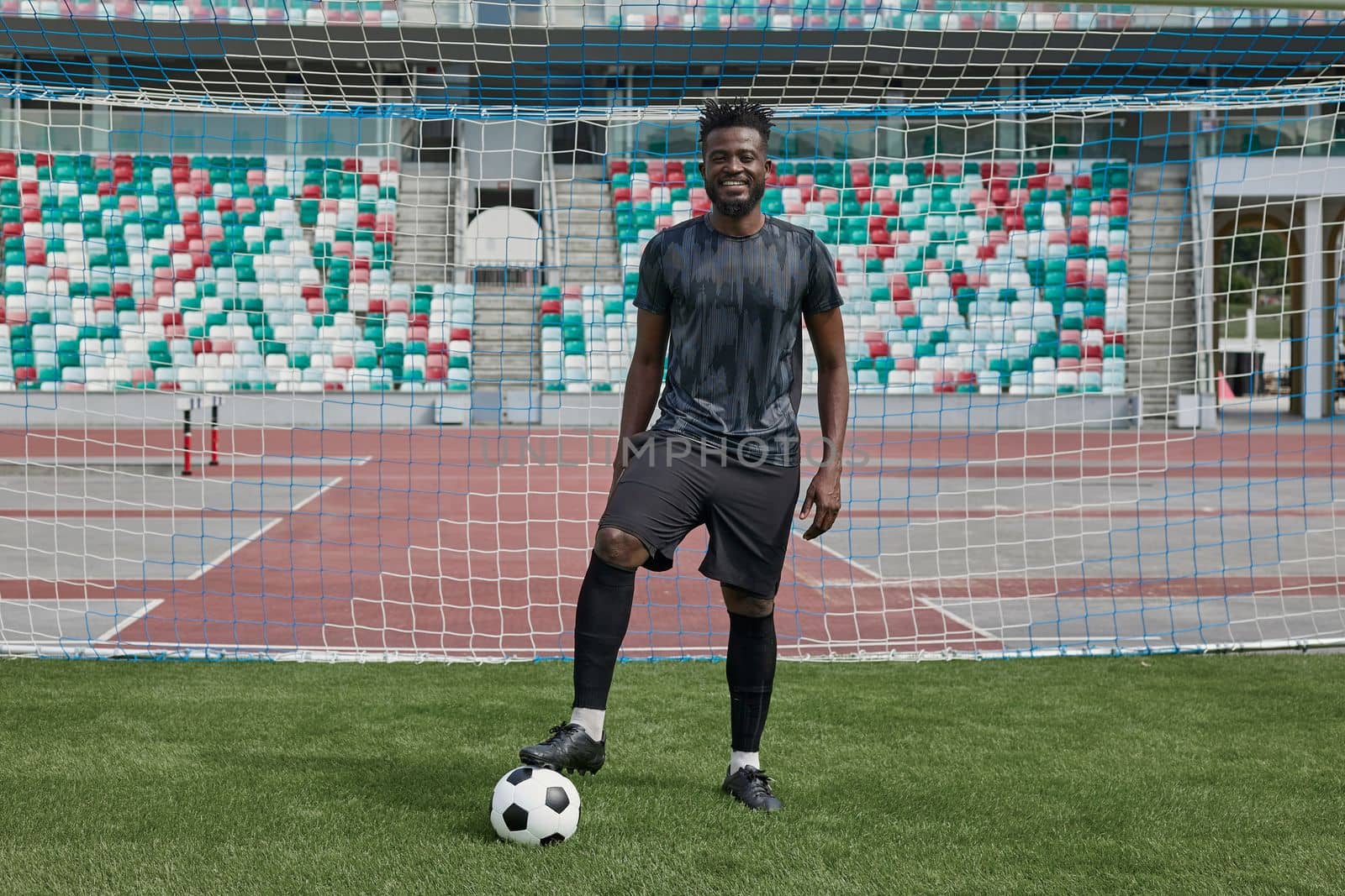 afro american ball player in the stadium