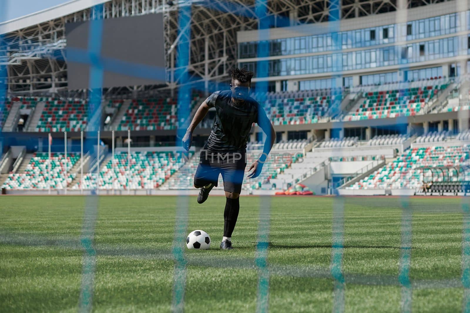 Football, soccer goal net with green grass background