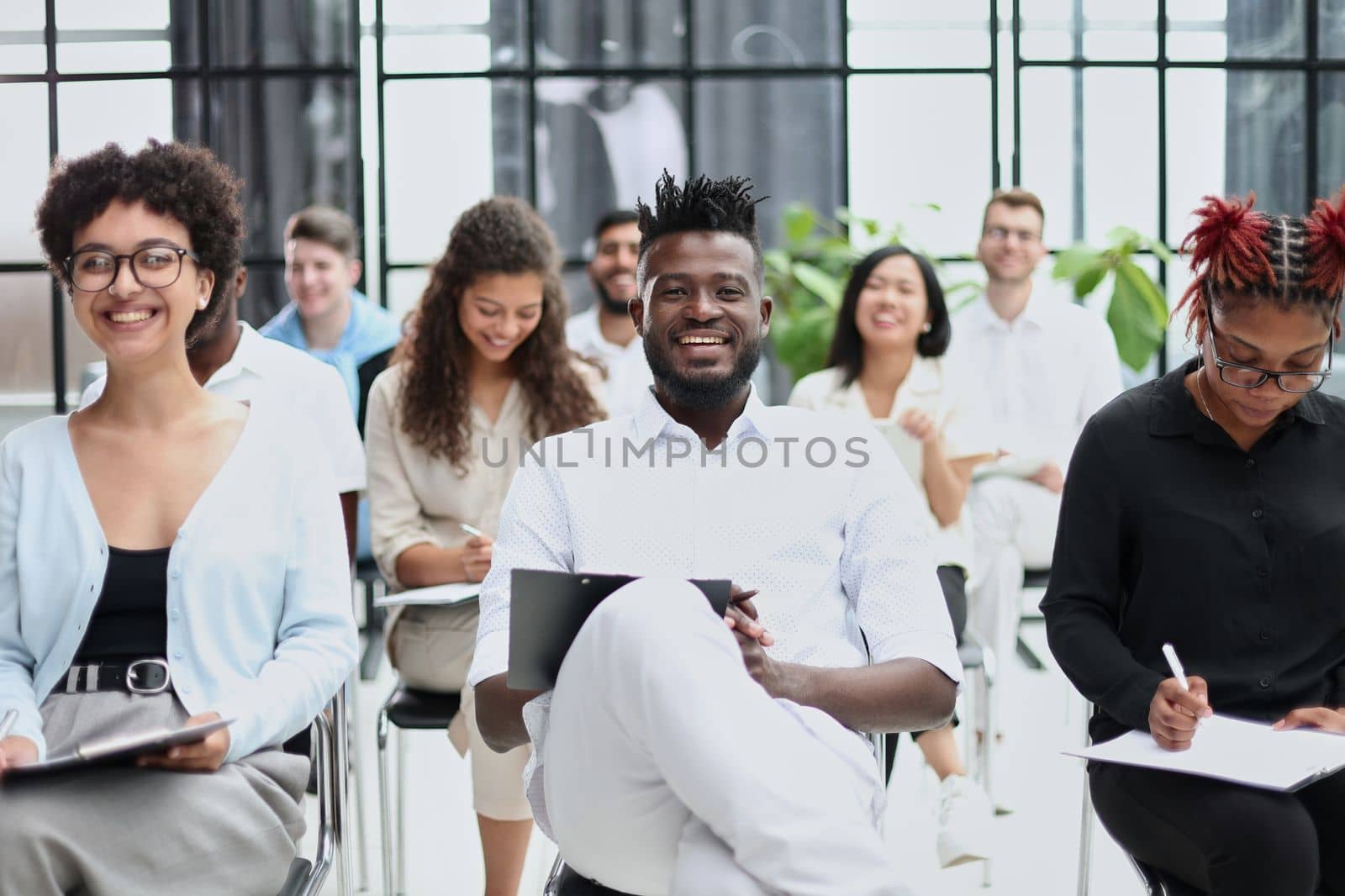 Group of multi-ethnic business people in a seminar